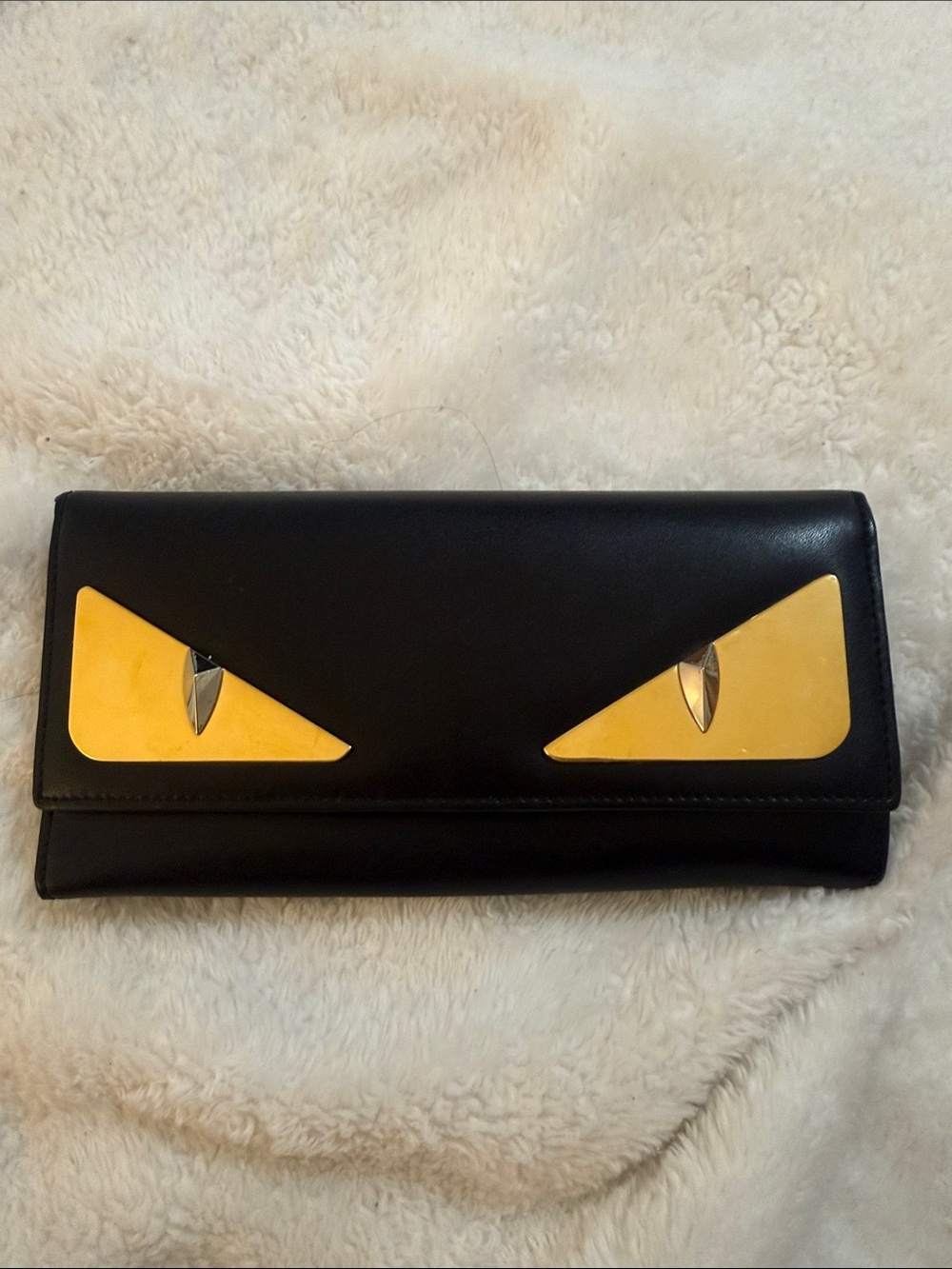Authentic Fendi Black Leather Wallet with Gold Eye Accents